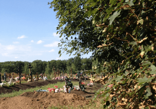 Як ховають бойовиків "ДНР" - фото