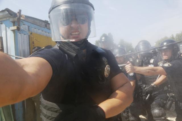 Поліцейський свідомо розпилив газ журналісту в обличчя на акції проти забудови в Києві, - НСЖУ