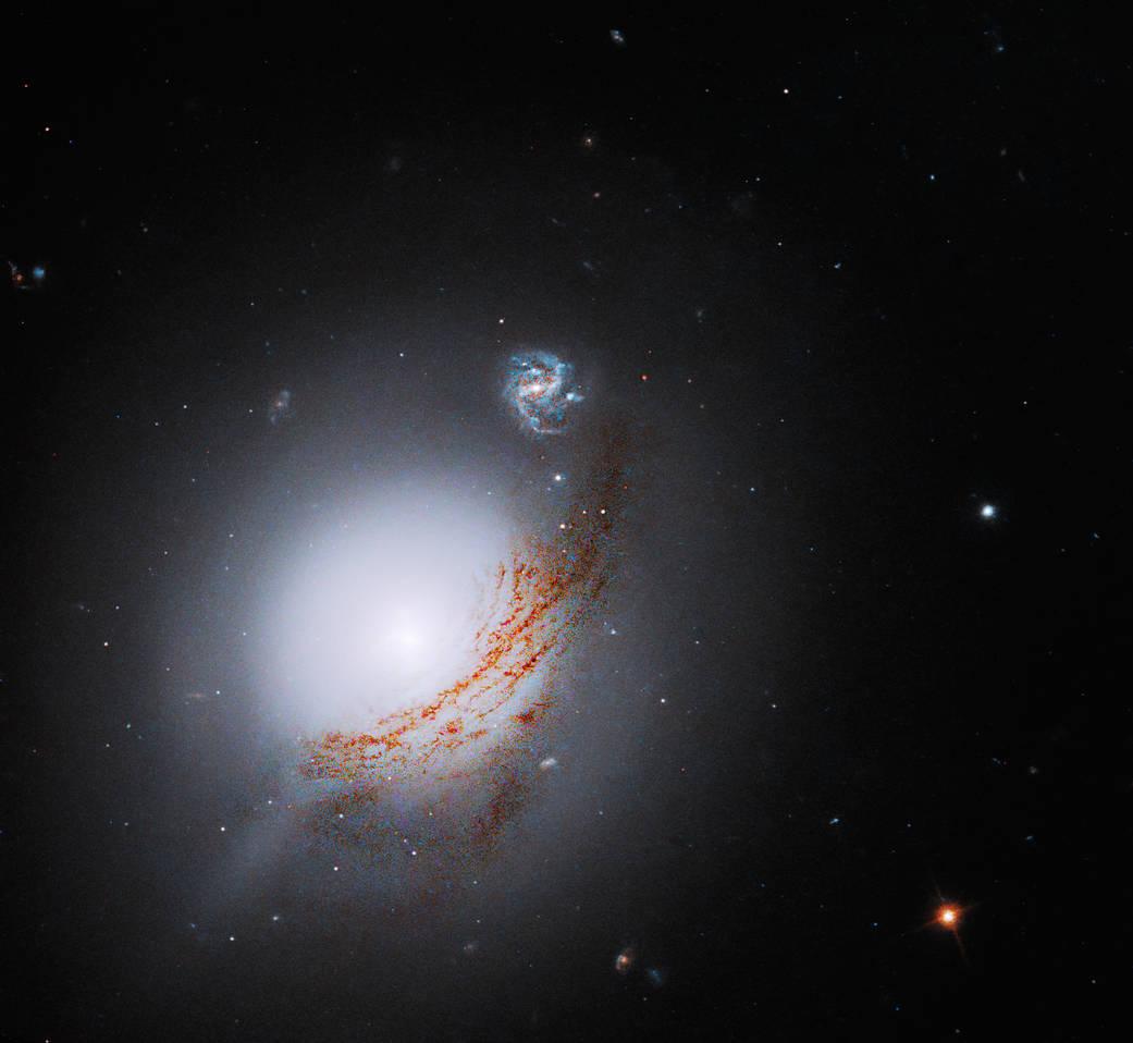 Телескоп Hubble поділився фото рідкісної яскравої галактики